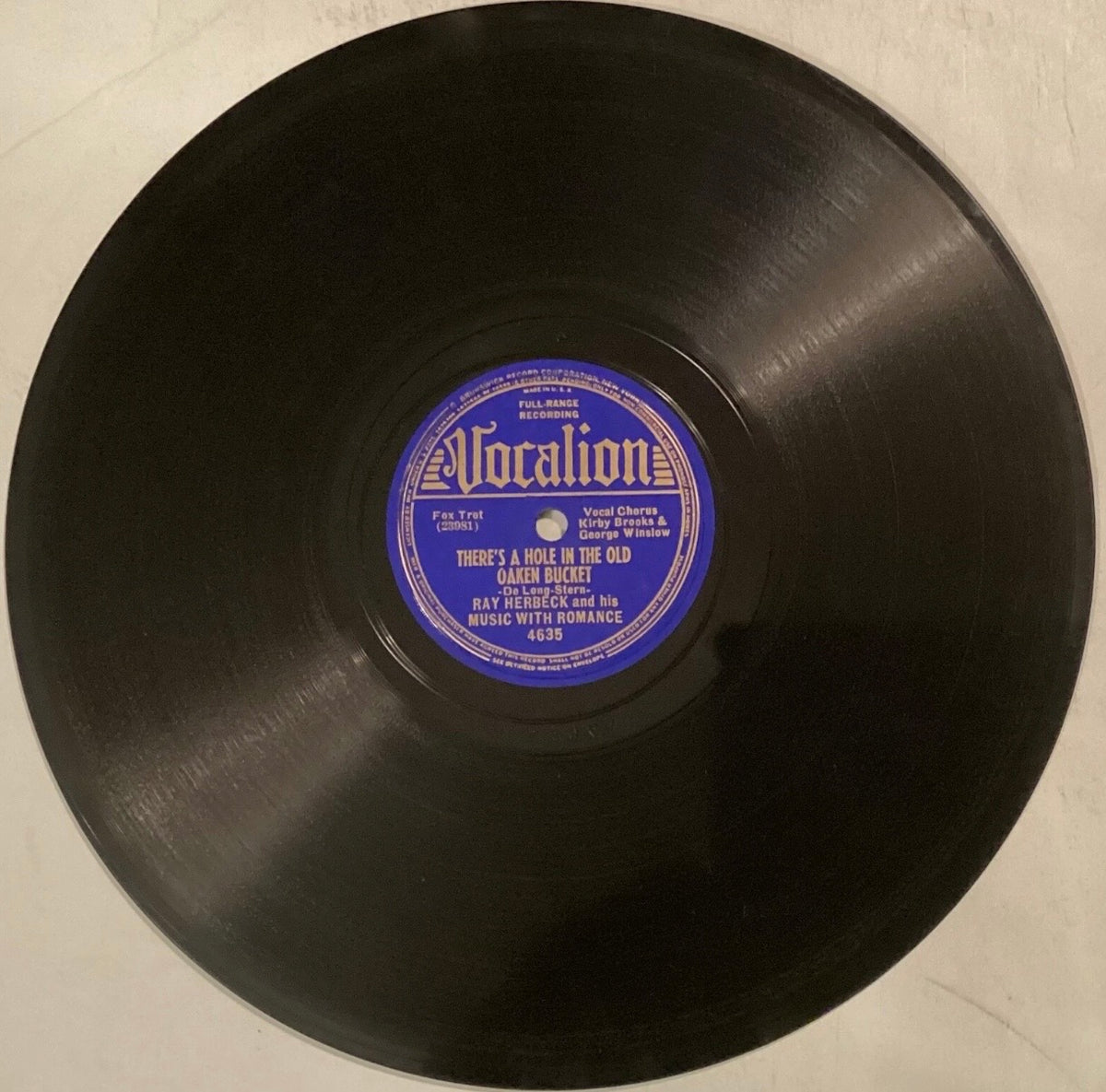Ray Herbeck Music with Romance – 78 rpm Vocalion 4635: There’s a Hole in the Old Oaken Bucket/Romance Runs in the Family; V+ cond